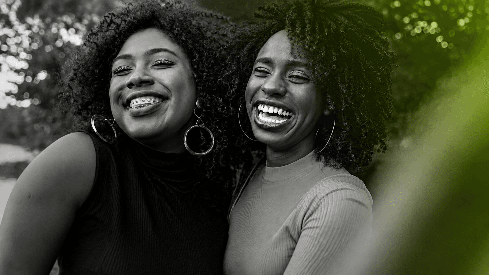 Two friends laughing together